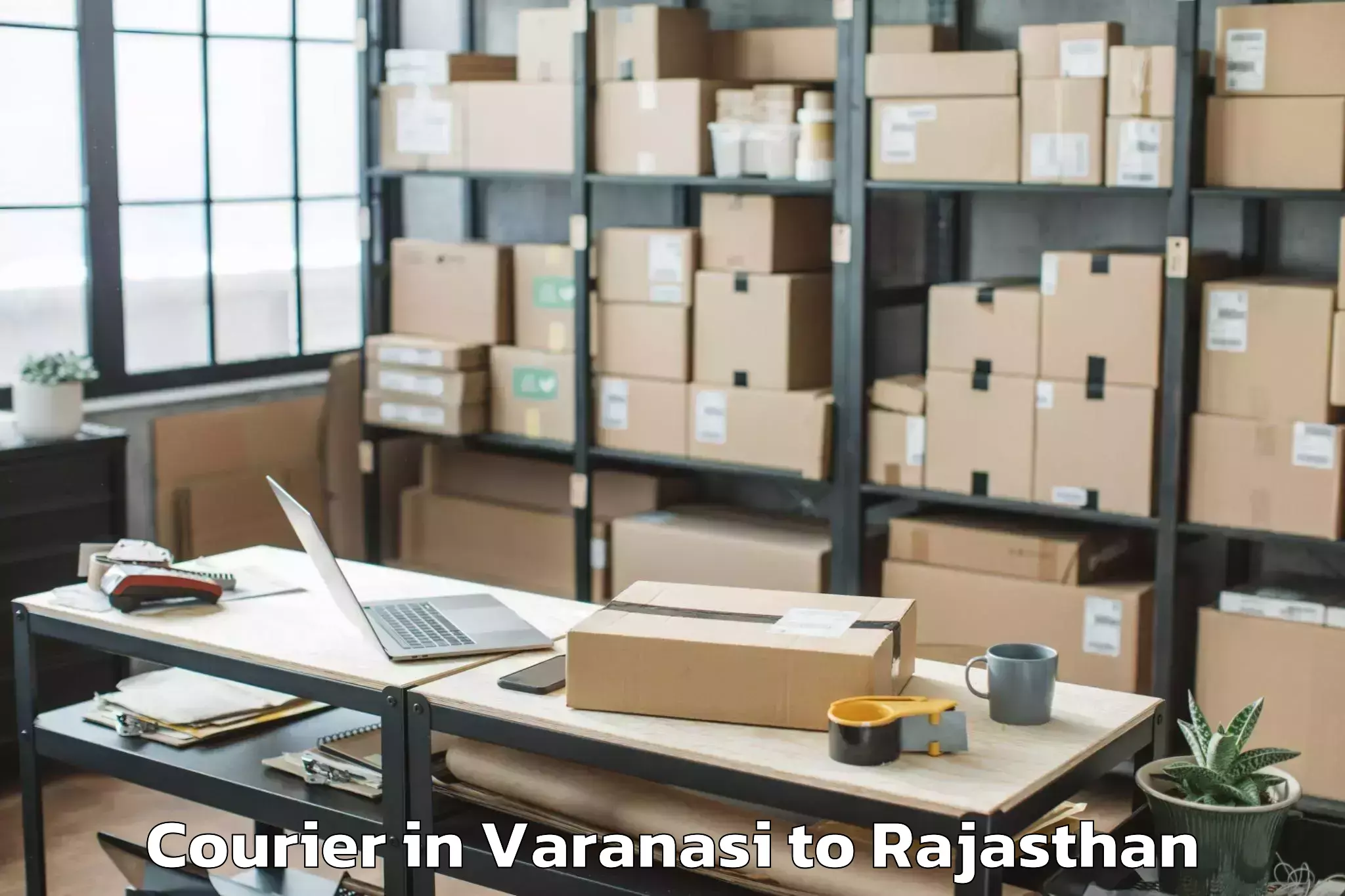 Top Varanasi to Opjs University Churu Courier Available